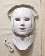 Contenu : masque visage, pièce cou amovible, sangle élastique et câble de charge